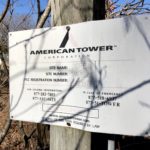 Identification sign posted on the gate to this American Tower structure in Corbin, Virginia